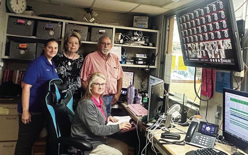 E-911 PERSONNEL pictured above are: seated, Dispatcher Sarah Brannon, standing left to right are, Dixie Jordan, E-911 Director Frankie Tolar, and Catahoula Parish OHSEP Director Ellis Boothe.